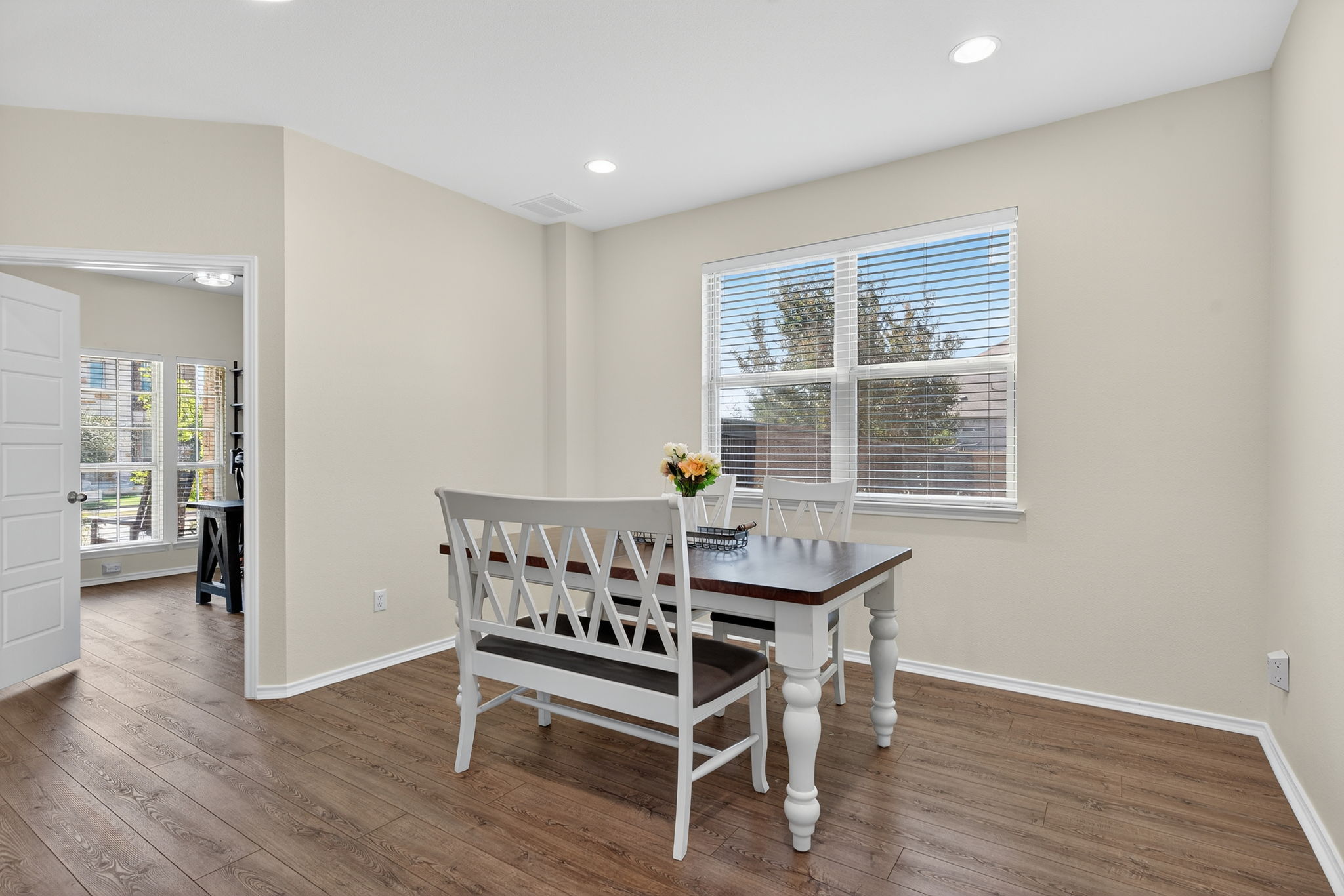 13300 Craven Lane Manor, TX 78653 - Photo 13 of 40 The dining room is located in-between the office and the kitchen/living room.