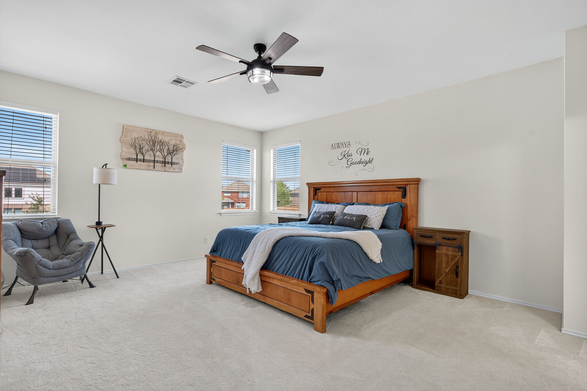 13300 Craven Lane Manor, TX 78653 - Photo 15 of 40 Huge Primary Bedroom featuring lush carpet and a ceiling fan