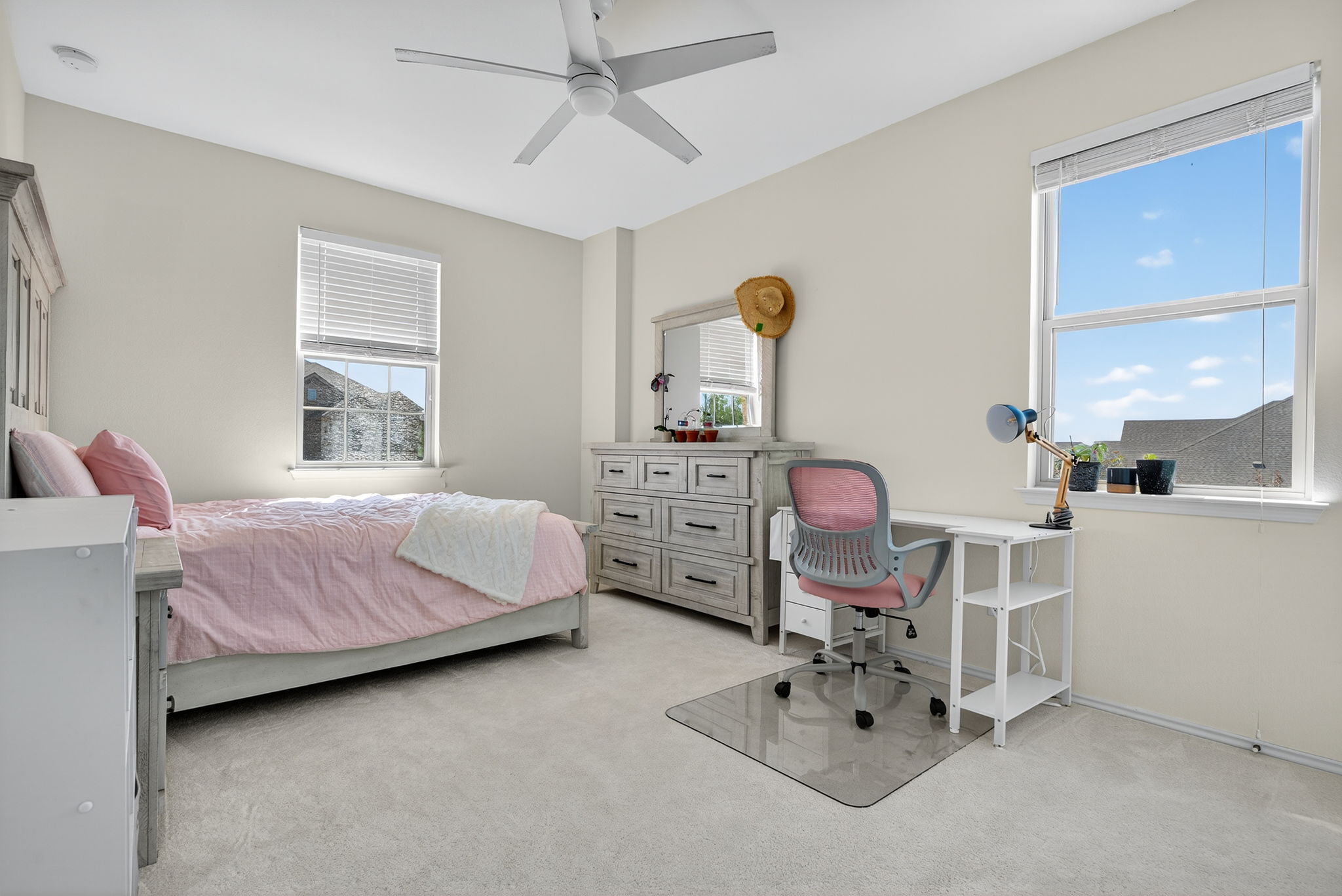 13300 Craven Lane Manor, TX 78653 - Photo 21 of 40 Huge Secondary Bedroom with high-end carpet, ceiling fan, and lots of natural light.