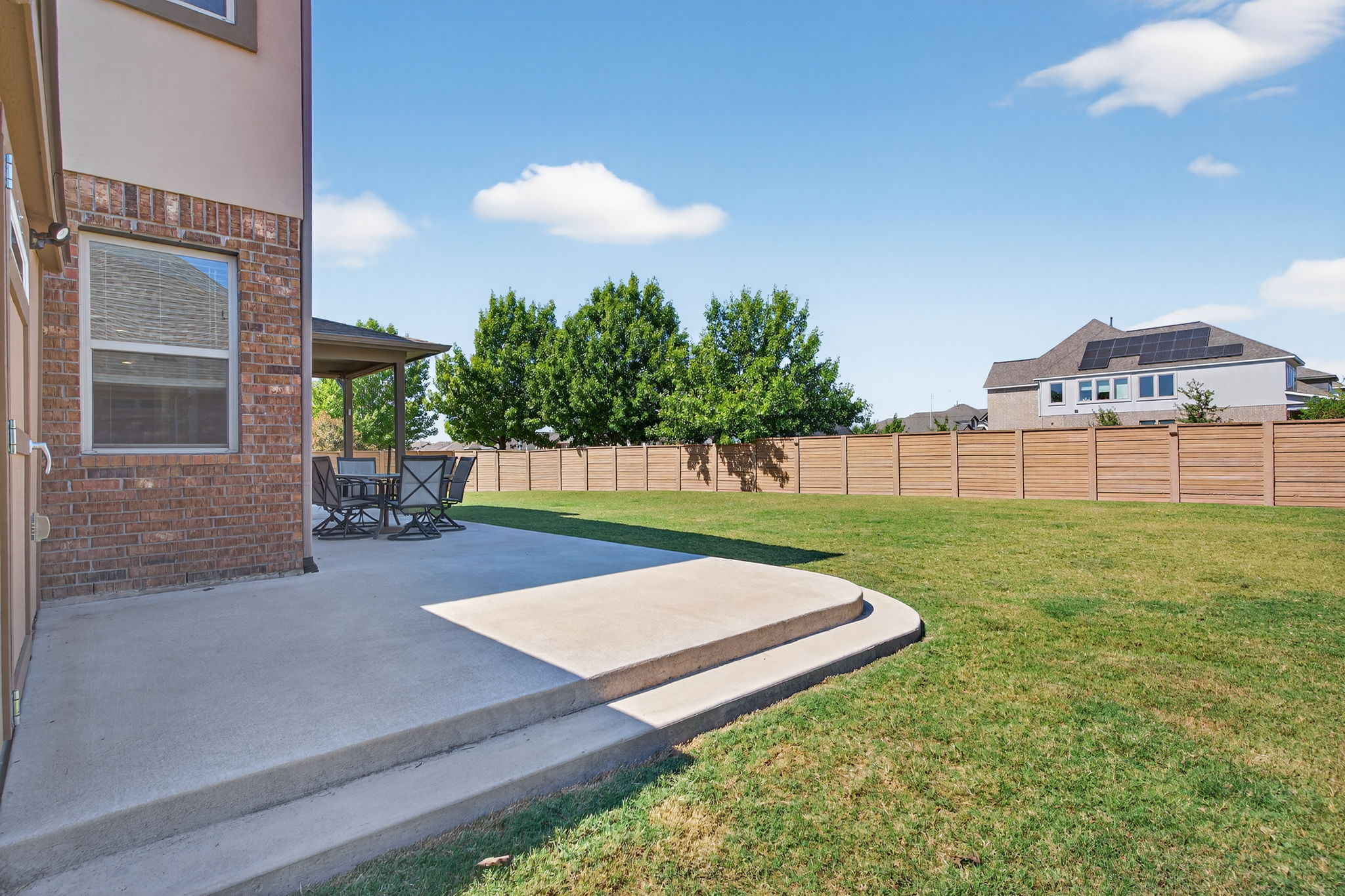 13300 Craven Lane Manor, TX 78653 - Photo 32 of 40 Fenced backyard featuring a patio area