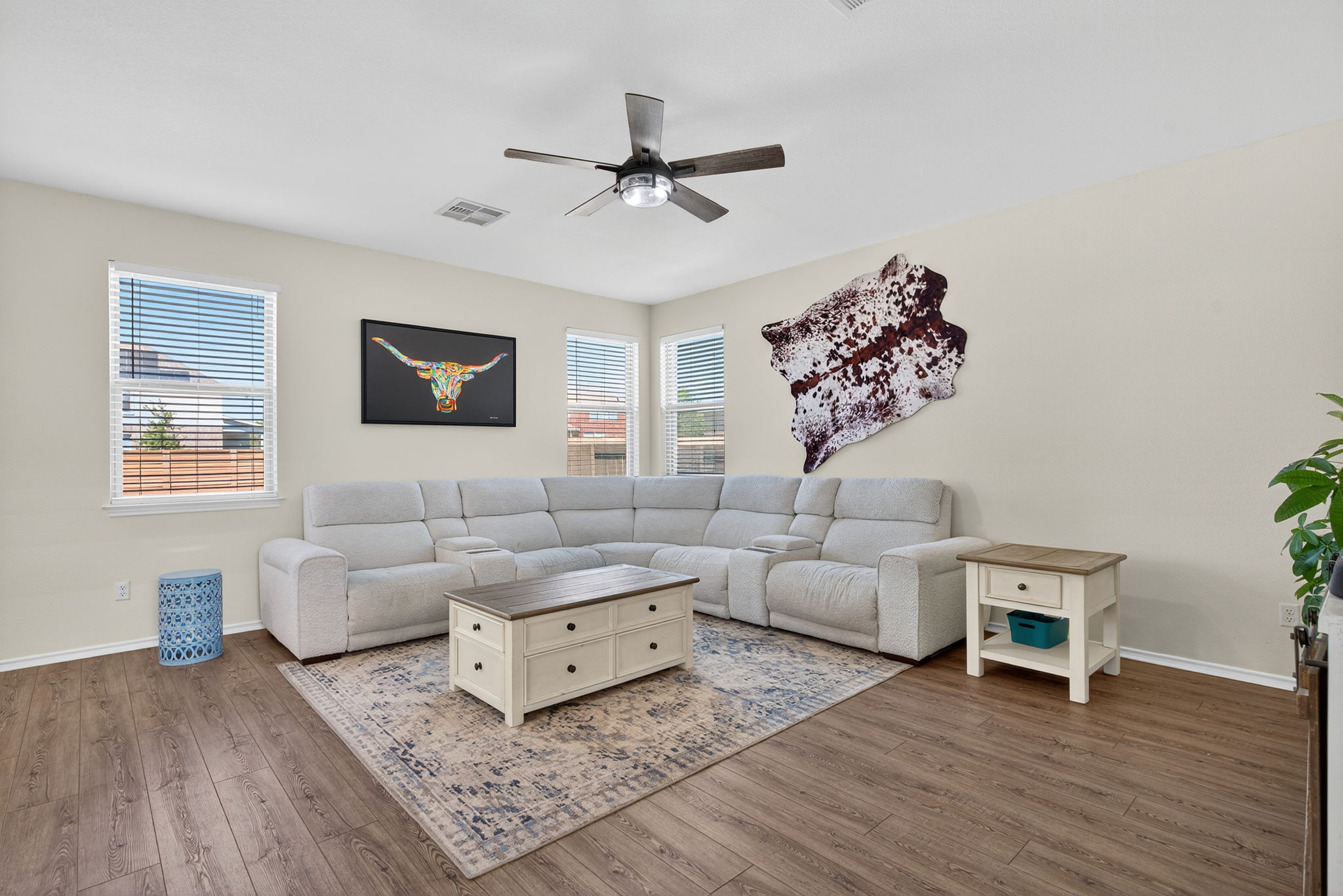 13300 Craven Lane Manor, TX 78653 - Photo 10 of 40 The living room windows overlook the massive Texas-sized backyard you get to enjoy everyday.