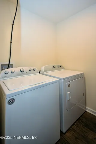 a utility room with dryer and washer