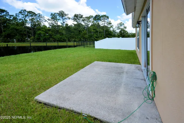 a view of a backyard with a garden