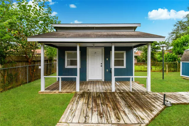 a backyard of a house with lots of green space