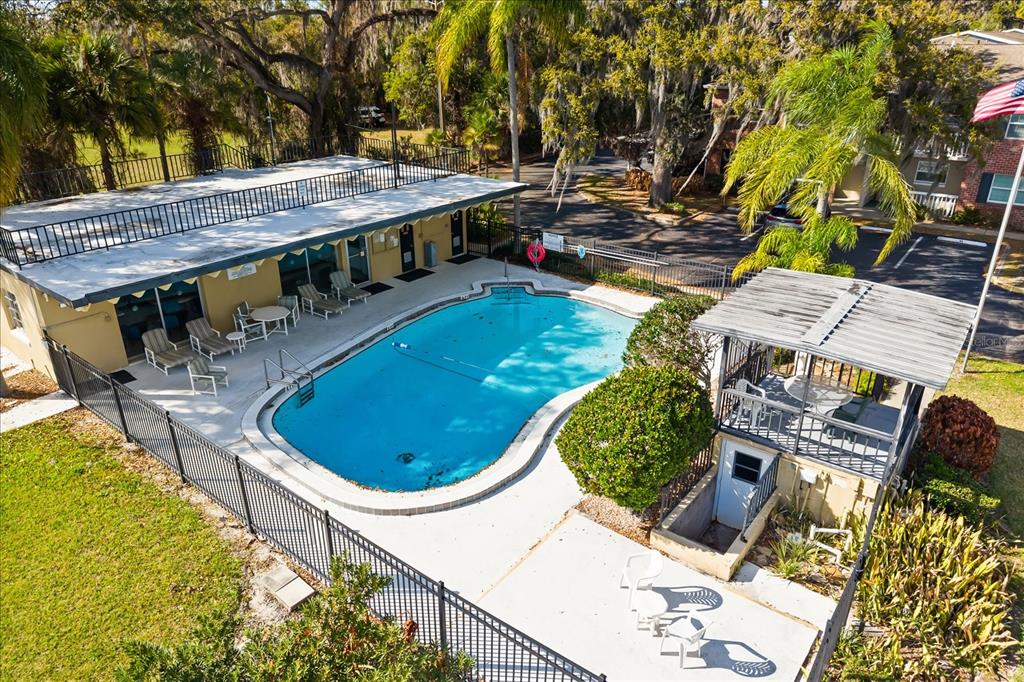 2500 Lee Road, Unit 122 Winter Park, FL 32789 - Photo 18 of 25 a view of a swimming pool with a patio