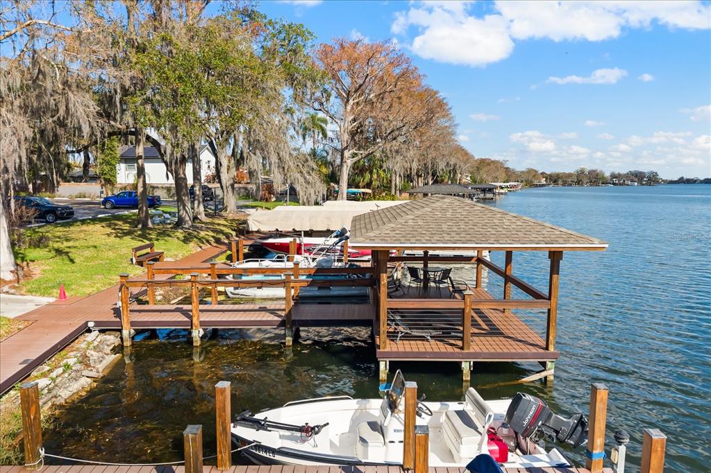 2500 Lee Road, Unit 122 Winter Park, FL 32789 - Photo 19 of 25 a view of a patio with table and chairs and potted plants