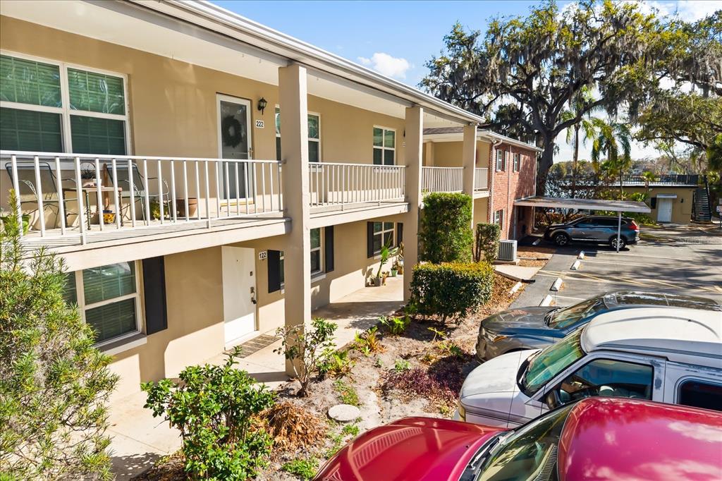 2500 Lee Road, Unit 122 Winter Park, FL 32789 - Photo 2 of 25 a view of a house with backyard porch and sitting area