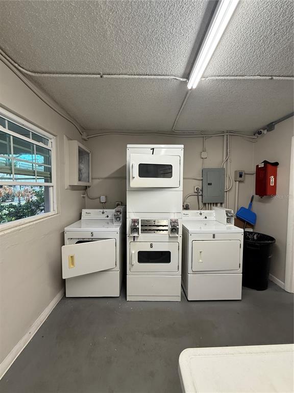 2500 Lee Road, Unit 122 Winter Park, FL 32789 - Photo 25 of 25 a utility room with dryer and washer