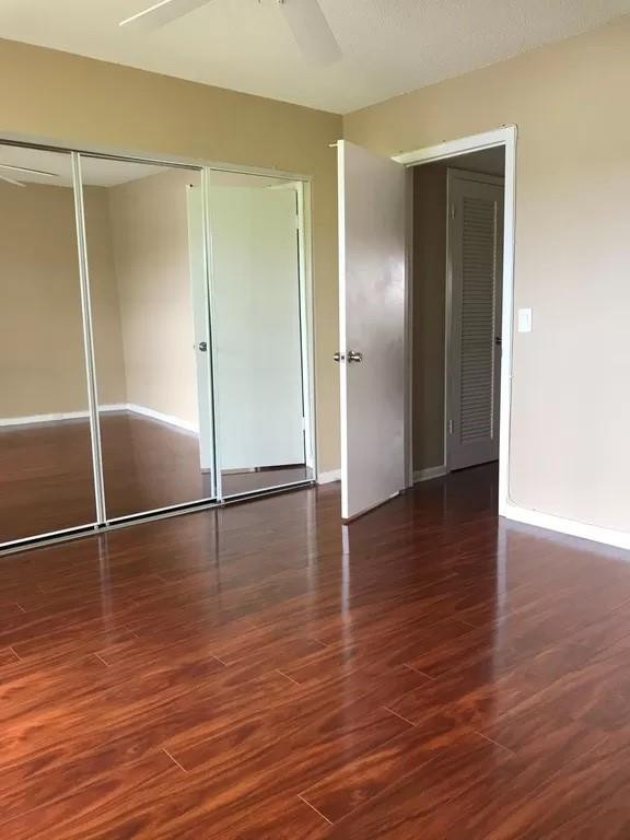 21 Dorset A Boca Raton, FL 33434 - Photo 4 of 7 a view of empty room with wooden floor