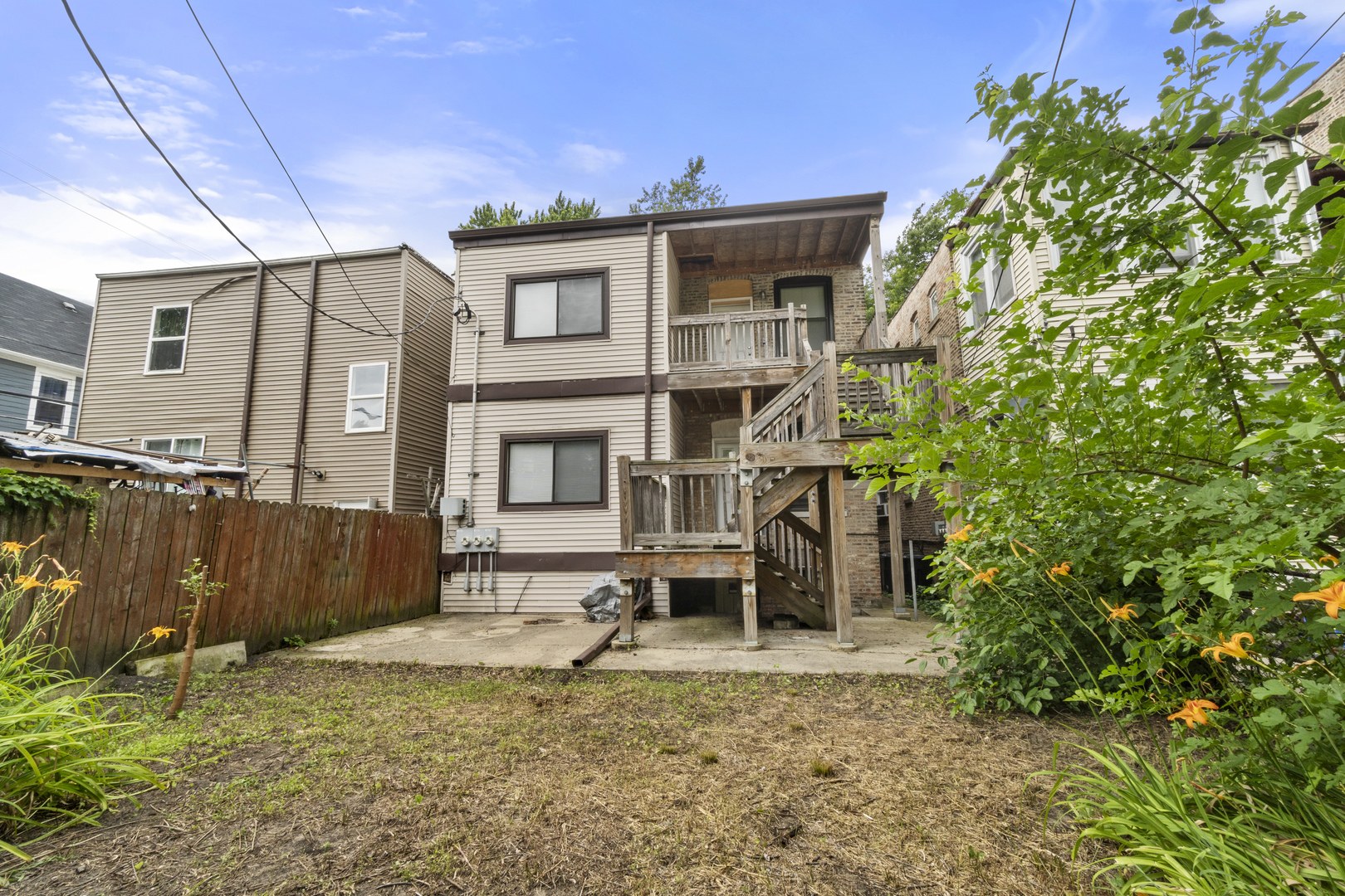 7223 North Damen Avenue Chicago, IL 60645 - Photo 37 of 37 a view of a house with a yard