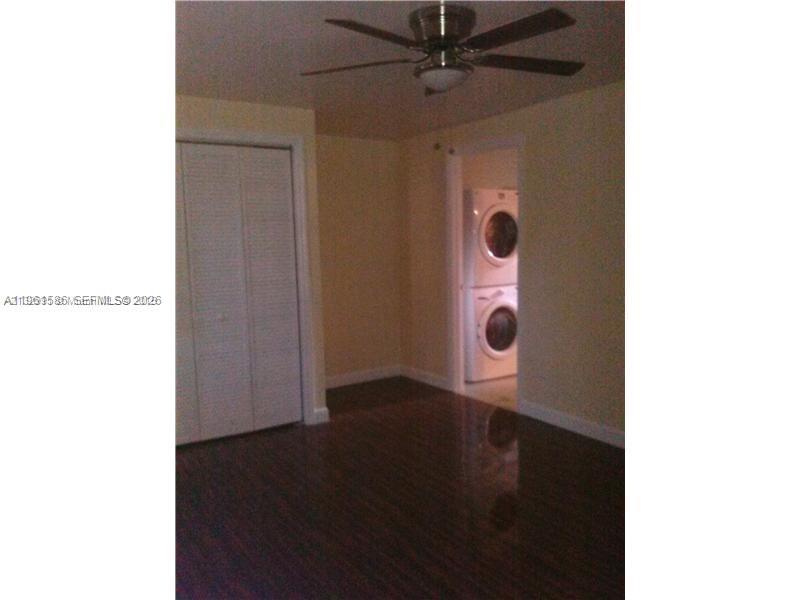 5614 Taylor Street, Unit B Hollywood, FL 33021 - Photo 5 of 10 primary bdrm door to laundry and bath