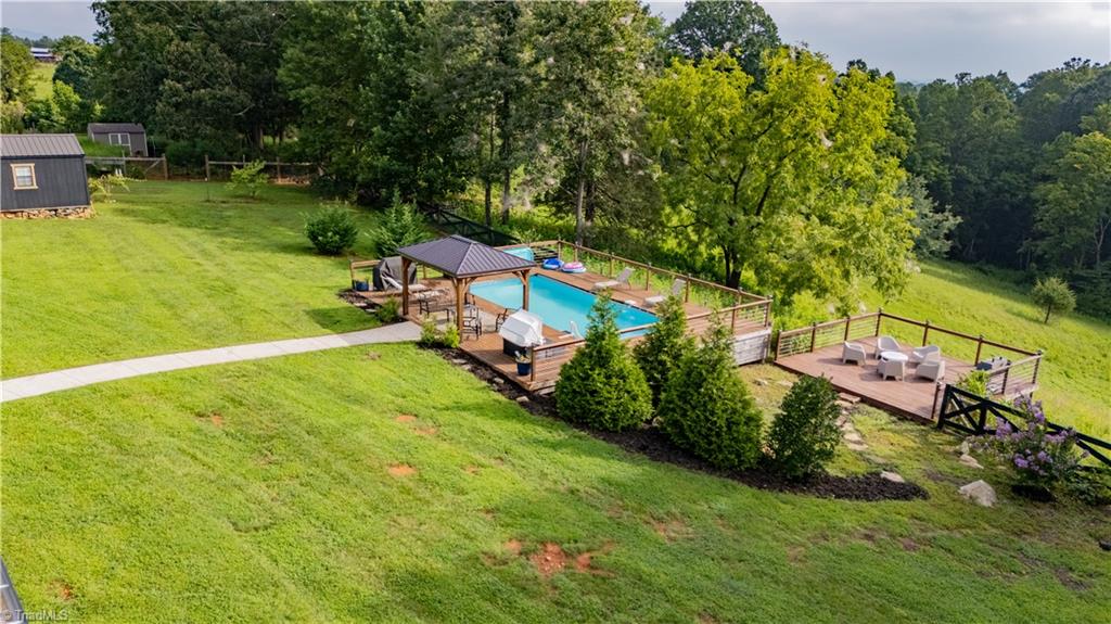 1009 Ray Loop Road Westfield, NC 27053 - Photo 11 of 45 Great pool deck for sunning or step over and grill some burgers