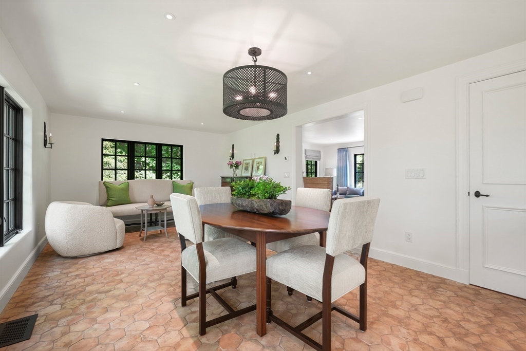 709 Boston Post Road Weston, MA 02493 - Photo 12 of 42 a dining room with furniture and window
