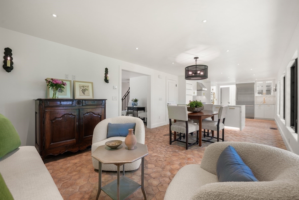 709 Boston Post Road Weston, MA 02493 - Photo 13 of 42 a living room with furniture rug and window