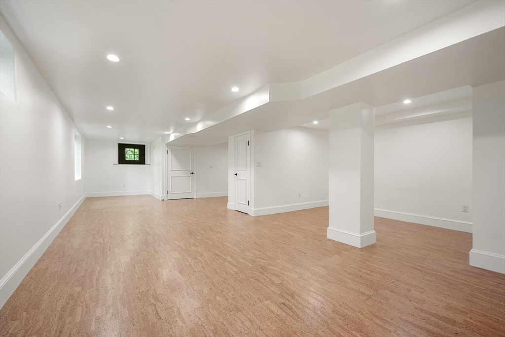 709 Boston Post Road Weston, MA 02493 - Photo 30 of 42 a view of an empty room with wooden floor
