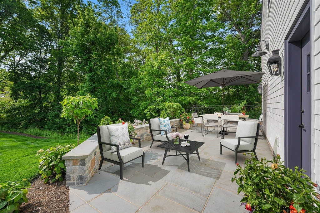 709 Boston Post Road Weston, MA 02493 - Photo 37 of 42 a view of backyard with seating area and green space