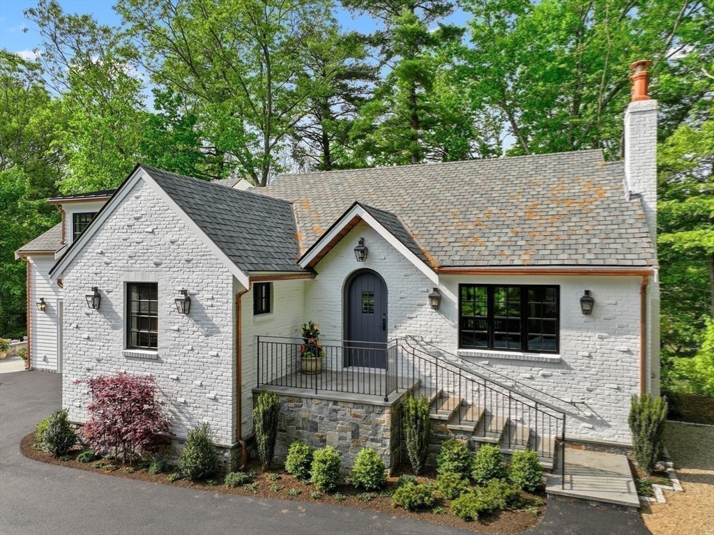 709 Boston Post Road Weston, MA 02493 - Photo 41 of 42 a front view of a house with garden