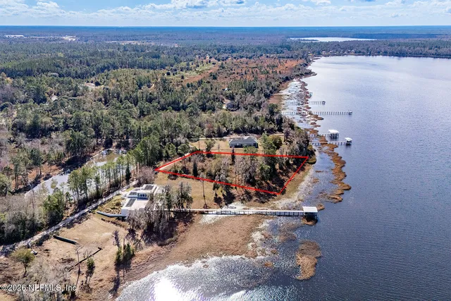 an aerial view of beach and ocean