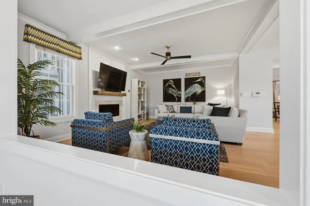 a bedroom with a bed window and a table