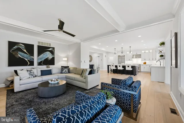 a bathroom with a shower a sink a toilet and shower