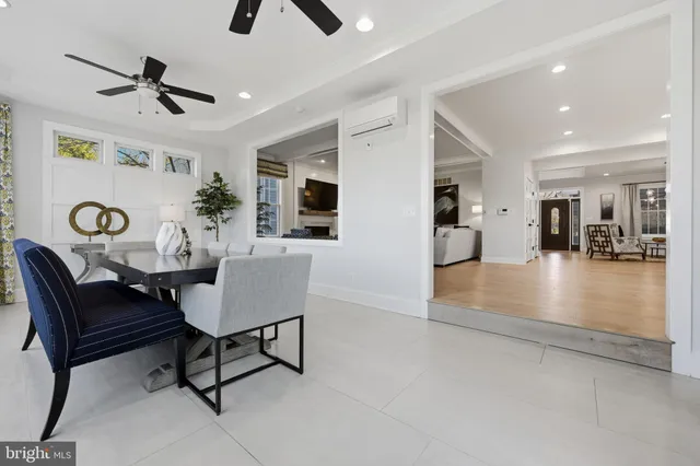 a bedroom with a bed and a chair in it