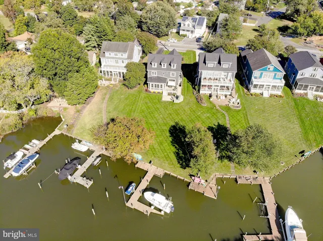 a living room with furniture window and wooden floor
