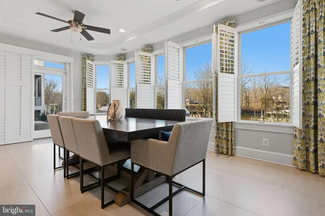 a bathroom with a sink a mirror and a window