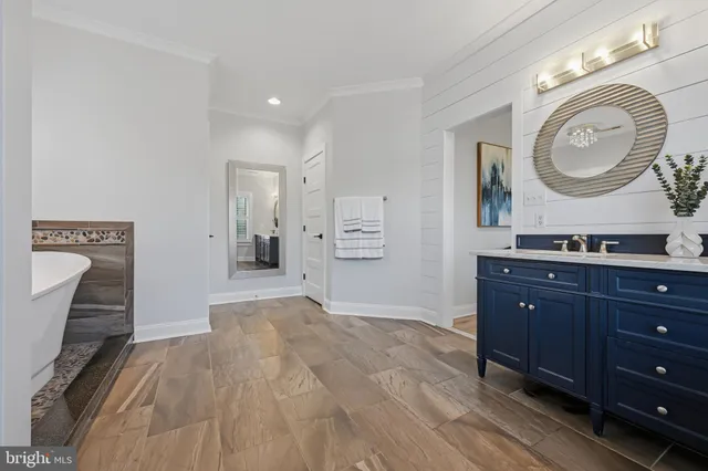 an aerial view of residential house with yard