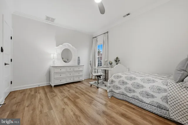 an aerial view of a house with a lake view