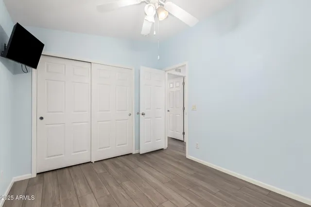 a view of a livingroom with wooden floor