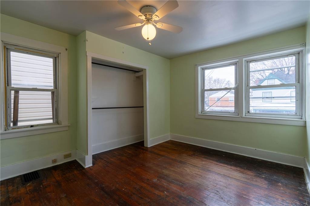 48 Sampson Avenue Pittsburgh, PA 15205 - Photo 13 of 18 a view of empty room with wooden floor and fan