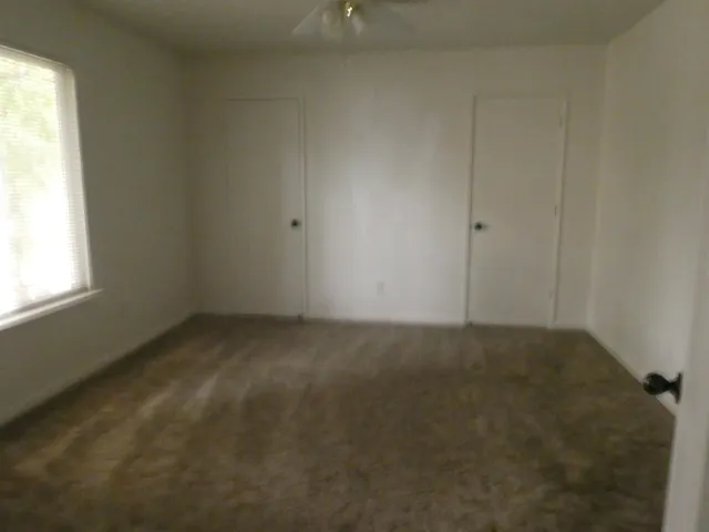 an empty room with a window