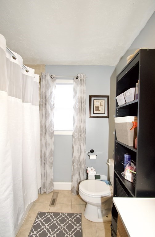 24 Rupert Street Springfield, MA 01108 - Photo 10 of 23 a bathroom with a sink toilet and shower
