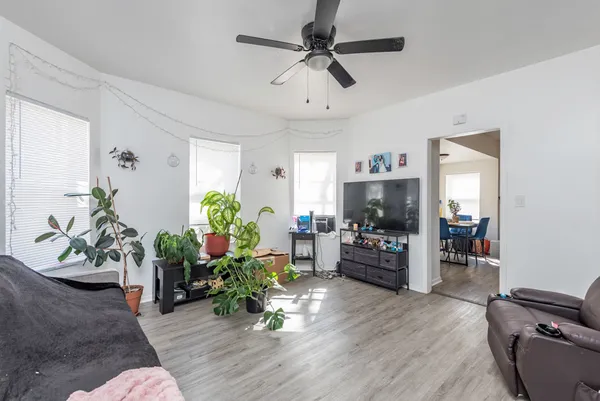 a room with furniture and a flat screen tv