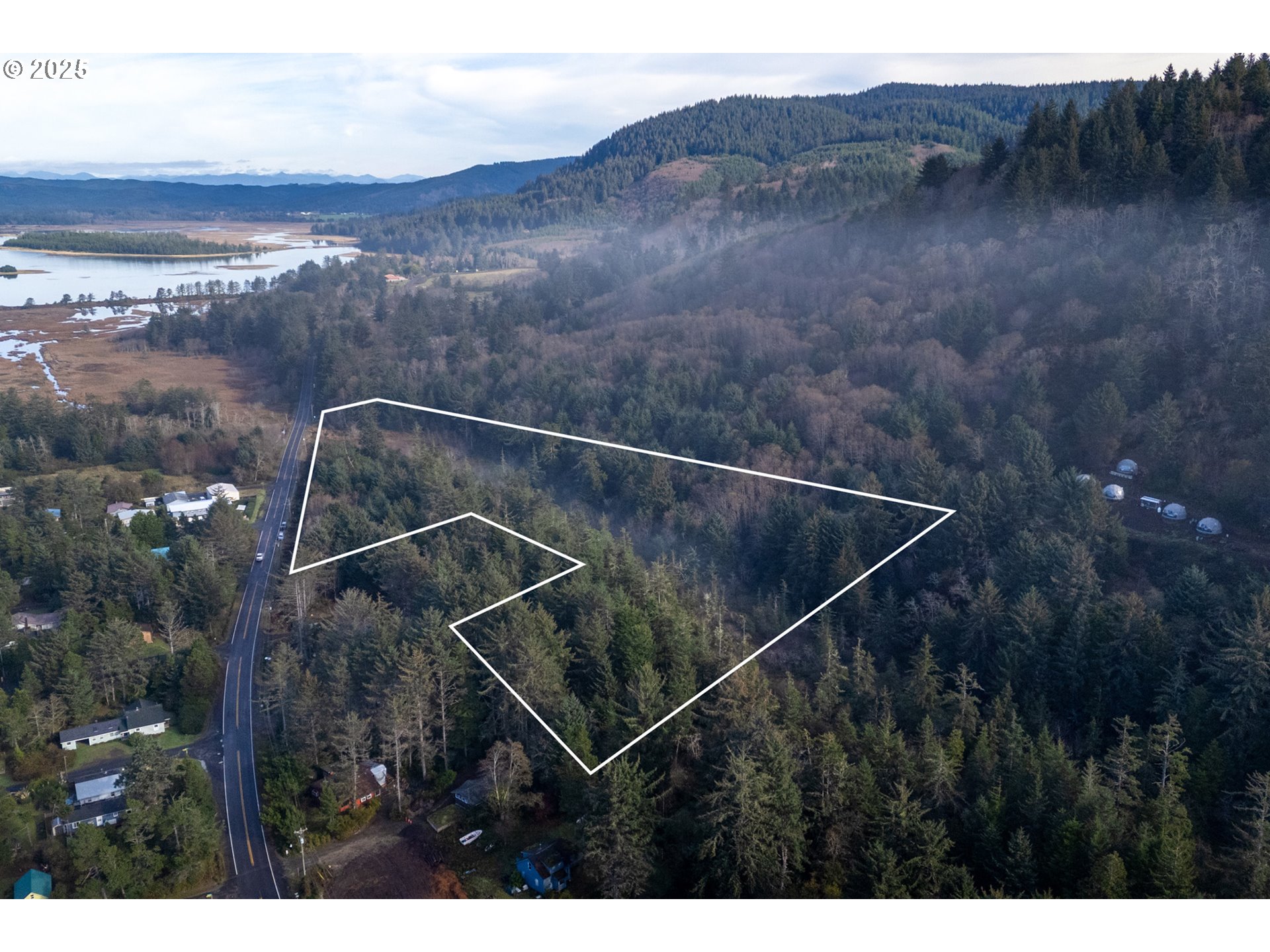 500 Sandlake Road Cloverdale, OR 97112 - Photo 8 of 12 a view of a backyard