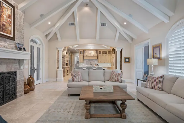 a kitchen with stainless steel appliances granite countertop a sink and cabinets