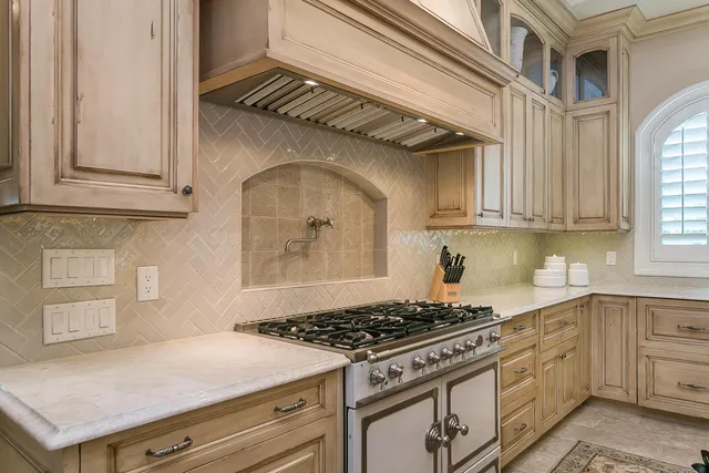 a view of a dining room with furniture and window