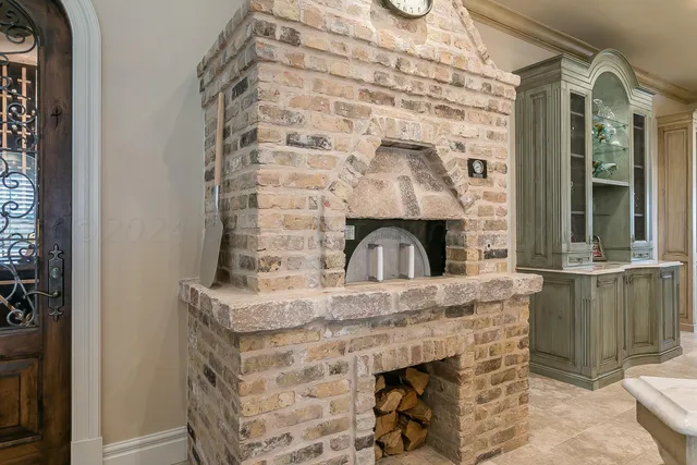a table with wine bottles and glasses on it