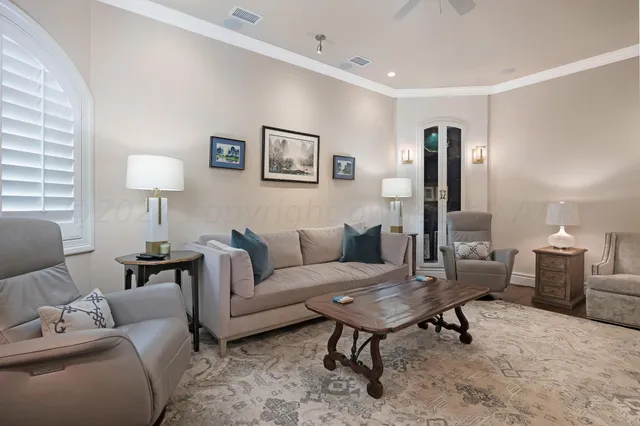 a bathroom with a glass shower door and mirror