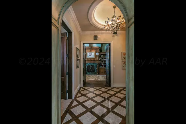 a room with furniture and a wooden floor