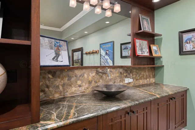 a view of a patio with table and chairs