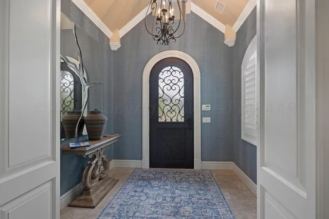 a living room with furniture ceiling fan and a rug