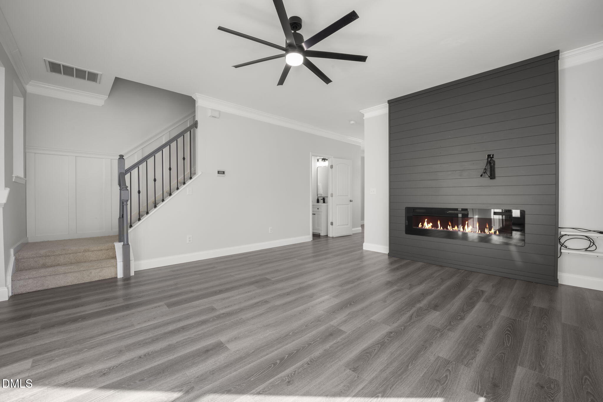 201 Leighann Ridge Lane Rolesville, NC 27571 - Photo 11 of 48 Owner opened up the Stairway wall and added custom trim up the stairwell, wood railing and custom ballusters. Brand New Carpet on staircase and entire second floor.