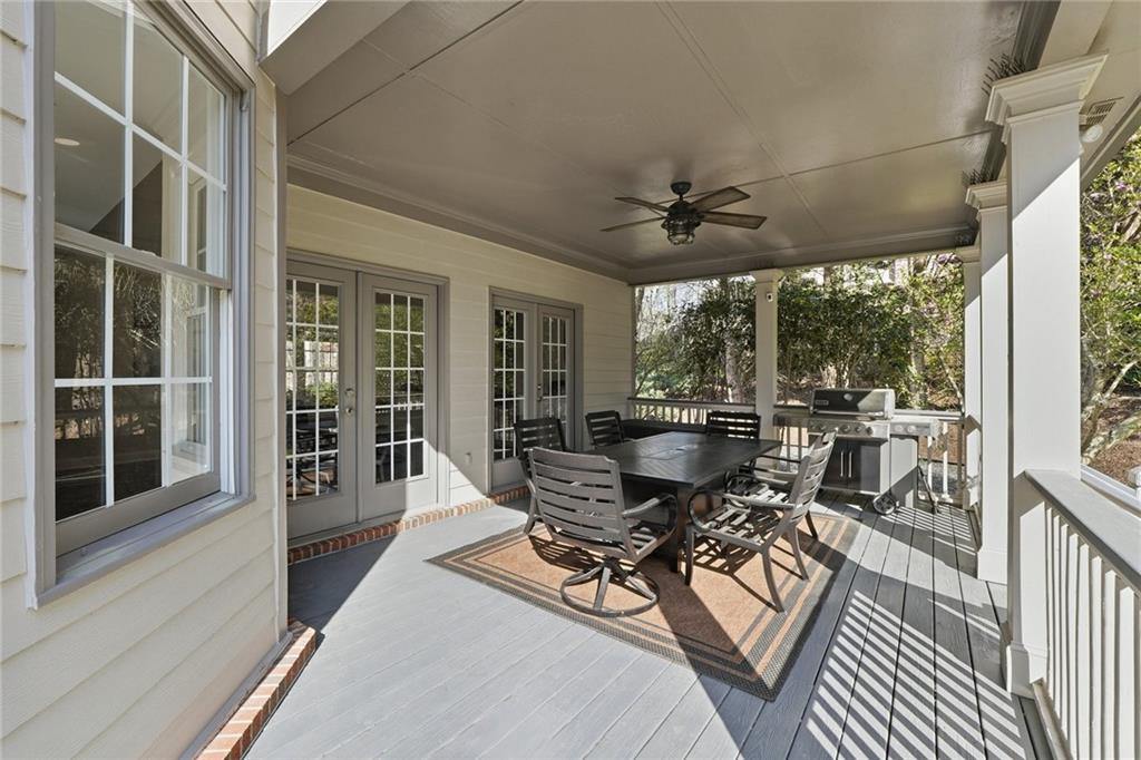 800 Barberry Drive Milton, GA 30004 - Photo 47 of 63 a dining room with furniture window and outside view