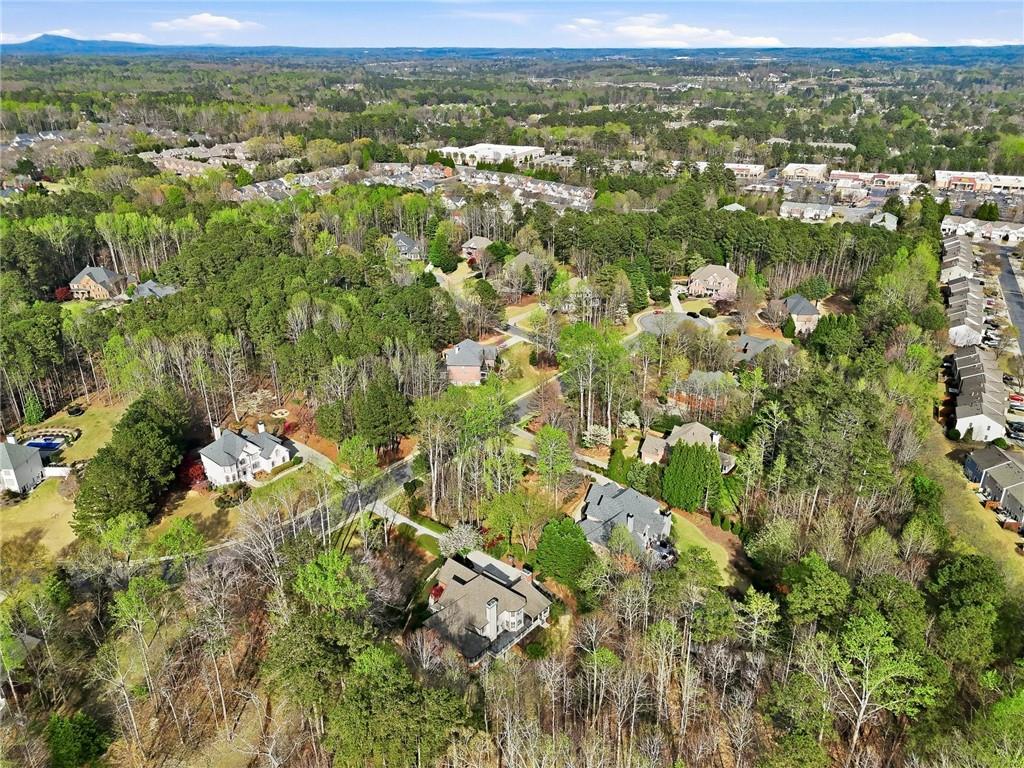 800 Barberry Drive Milton, GA 30004 - Photo 55 of 63 an aerial view of residential houses with outdoor space and trees