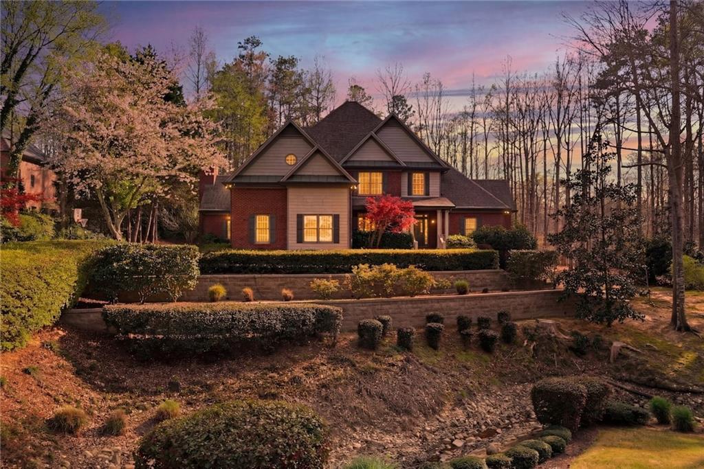 800 Barberry Drive Milton, GA 30004 - Photo 59 of 63 a front view of a house with a yard