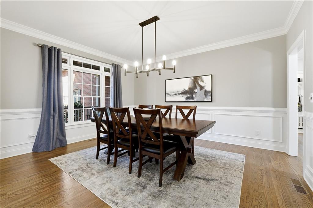 800 Barberry Drive Milton, GA 30004 - Photo 10 of 63 a view of a dining room with furniture window and wooden floor