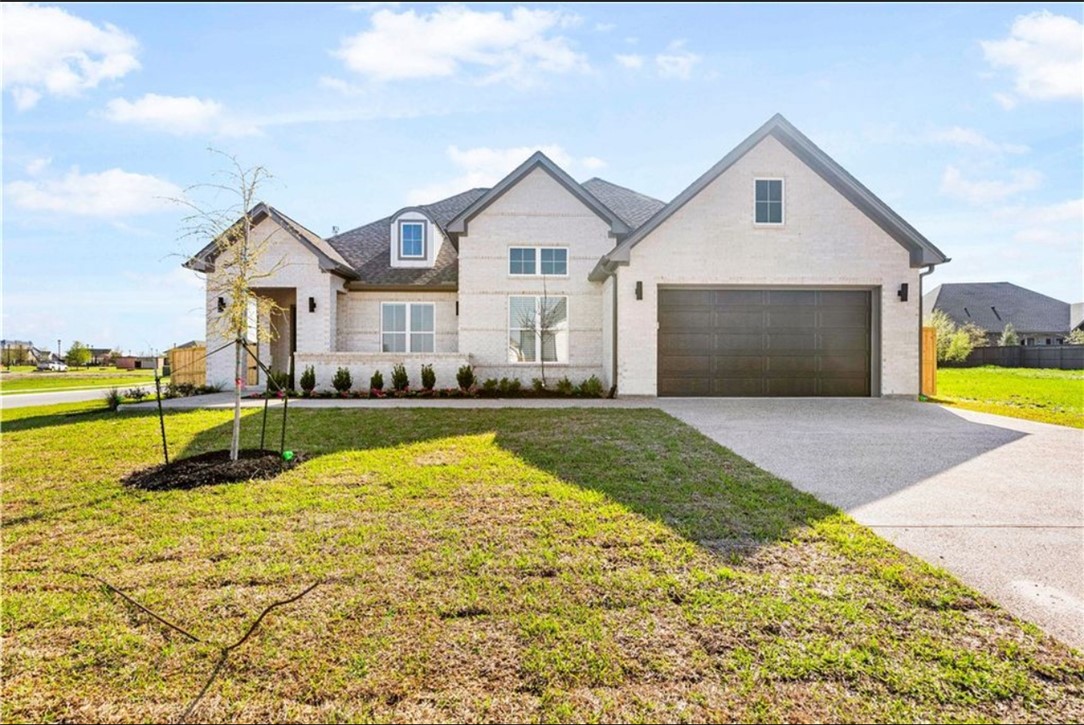 5102 Greenstone Way Bryan, TX 77802 - Photo 28 of 29 a view of a house with swimming pool and a yard