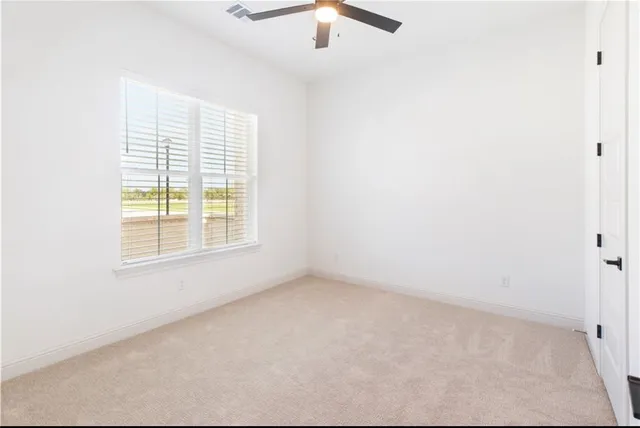 a bathroom with a double vanity sink mirror and shower