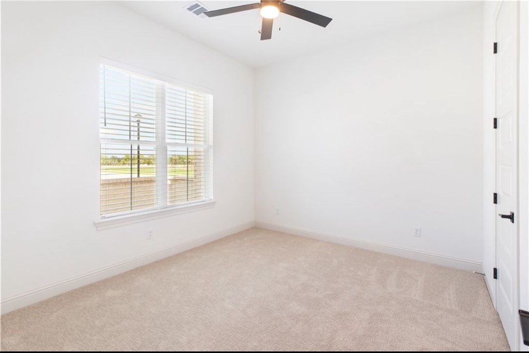 5102 Greenstone Way Bryan, TX 77802 - Photo 12 of 29 an empty room with a window
